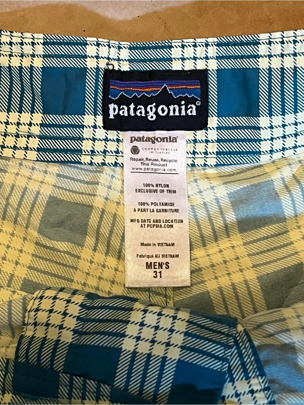 Patagonia plaid board shorts in teal and lime green